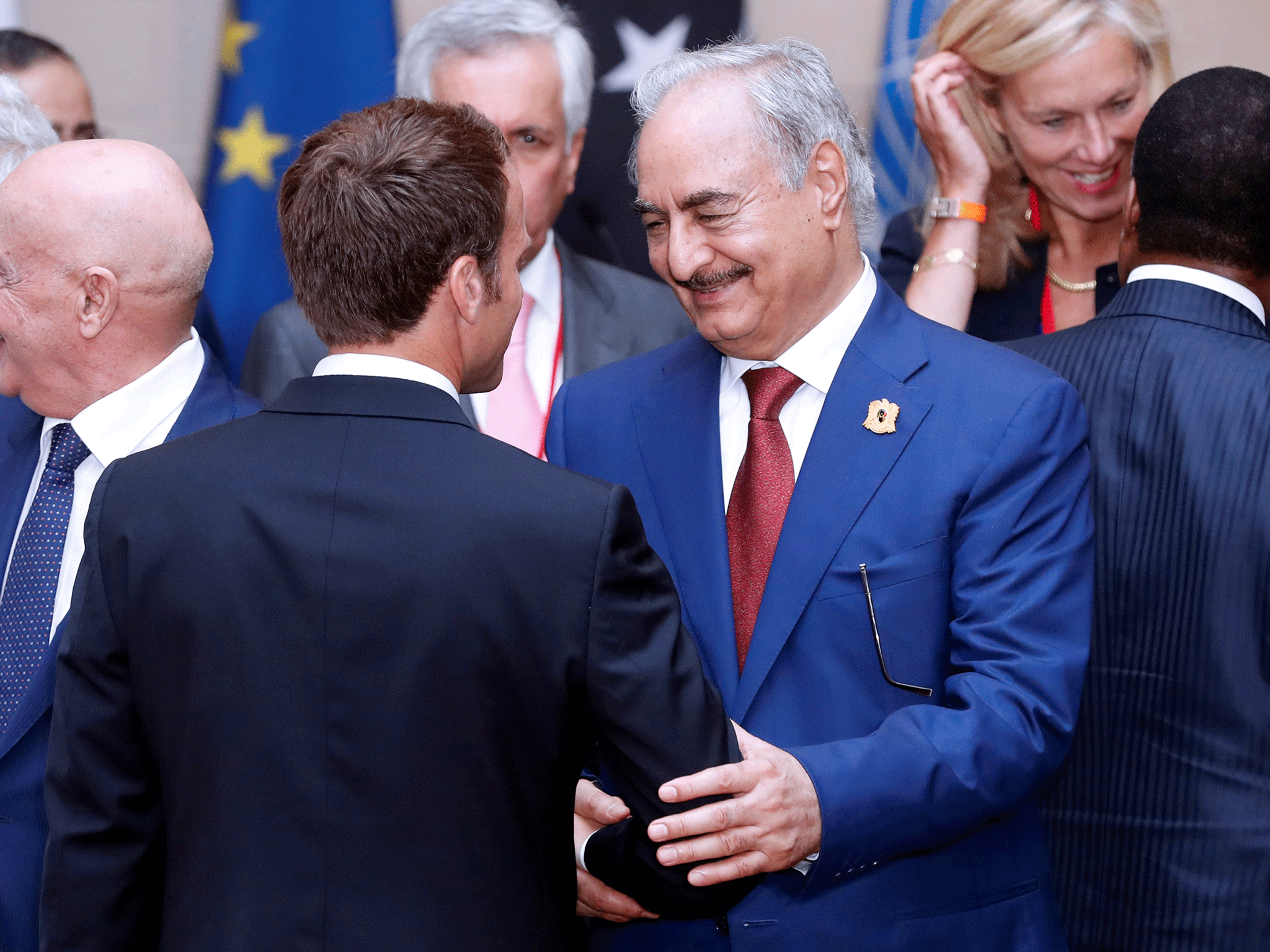 Khalifa Haftar shakes hands with French President Emmanuel Macron at the Elysee Palace in Paris on 29 May