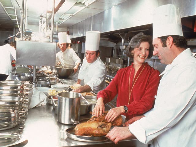 Barbara Kafka consults with chefs at the Windows on the World restaurant in the North Tower of the World Trade Centre