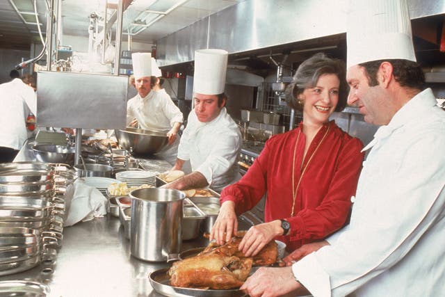 Barbara Kafka consults with chefs at the Windows on the World restaurant in the North Tower of the World Trade Centre