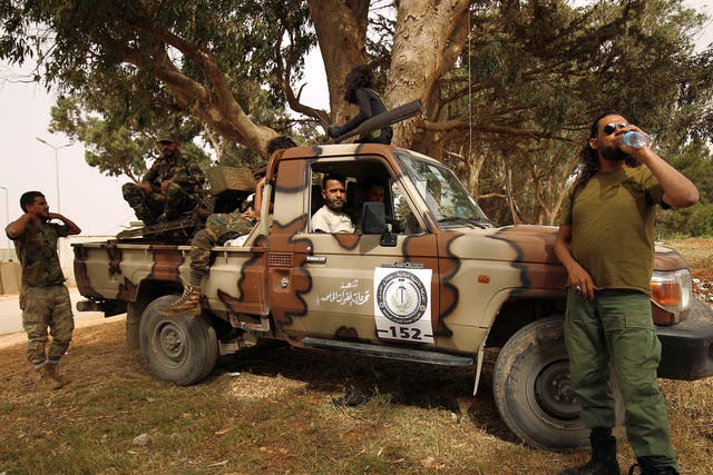 Libyan forces, loyal to Libyan strongman Khalifa Haftar, gather near the coastal city of Derna