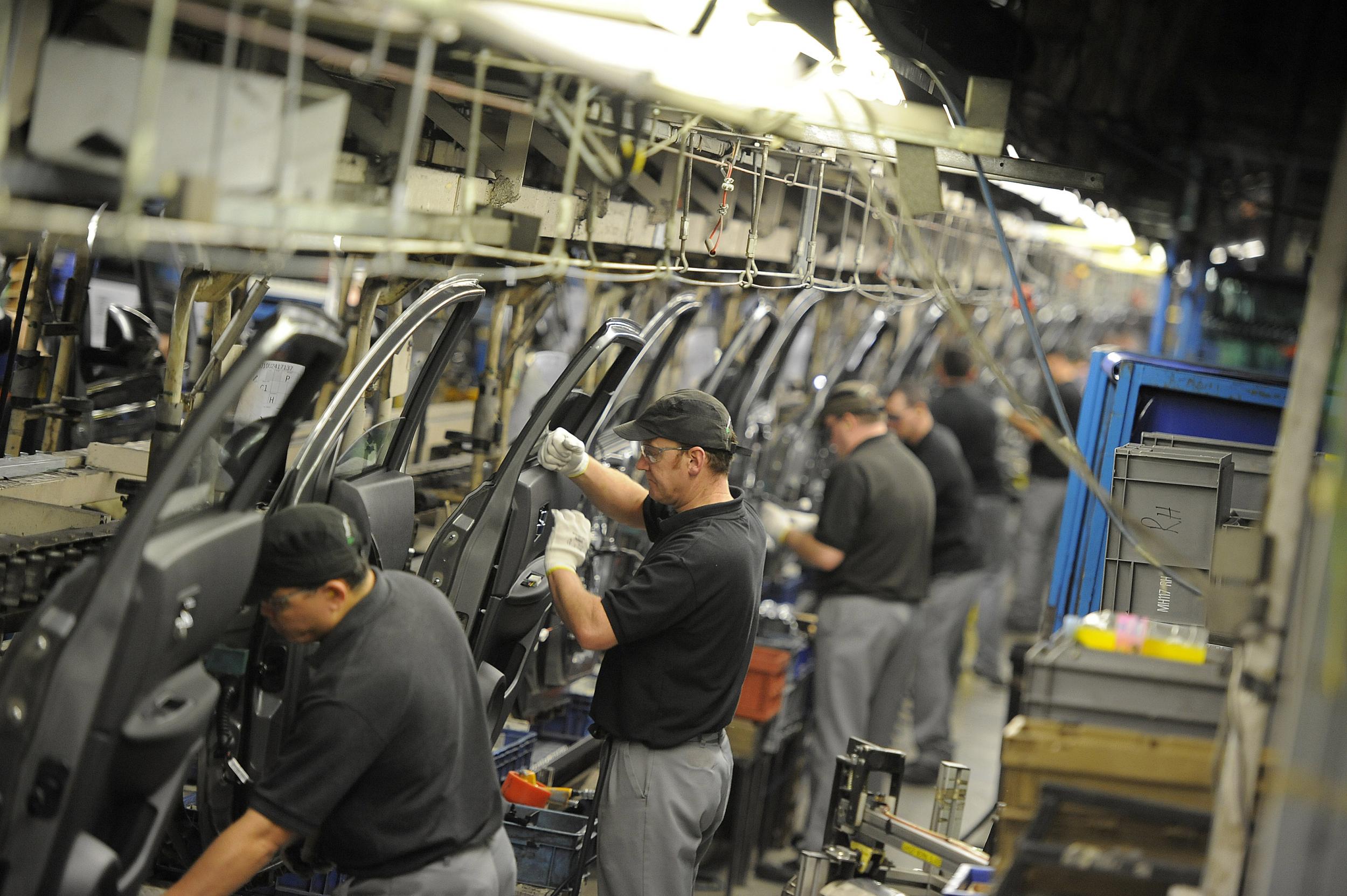 Workers at one of Nissan's UK plants. Motor manufacturers have warned the industry could collapse as a result of a no deal Brexit