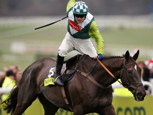 Jockey Sam Thomas rides Denman up the final straight to victory in 2008 Cheltenham Gold Cup