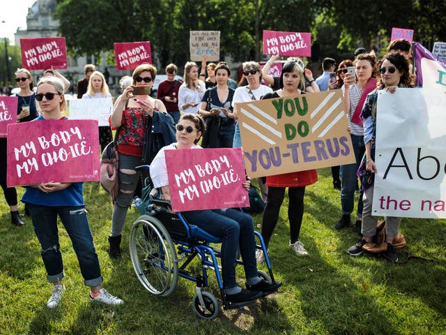 <p>Pro-choice campaigners staging demonstrations outside the Houses of Parliament</p>