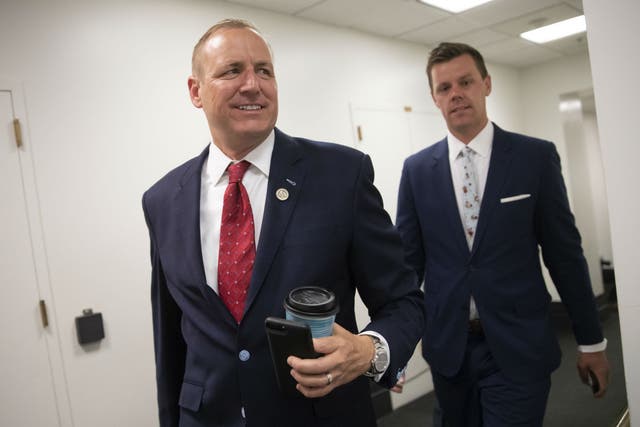 Rep. Jeff Denham arrives for a closed-door GOP meeting in the basement of the Capitol as the Republican leadership tries to reach a policy agreement between conservatives and moderates on immigration