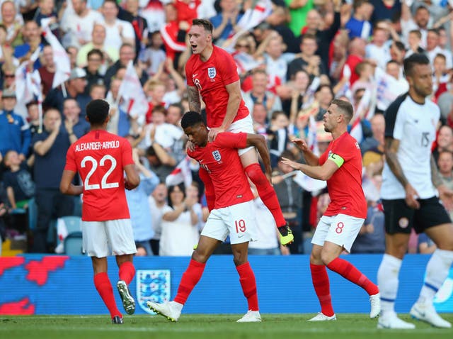 Marcus Rashford celebrates his goal for England