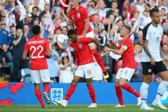 Marcus Rashford celebrates his goal for England