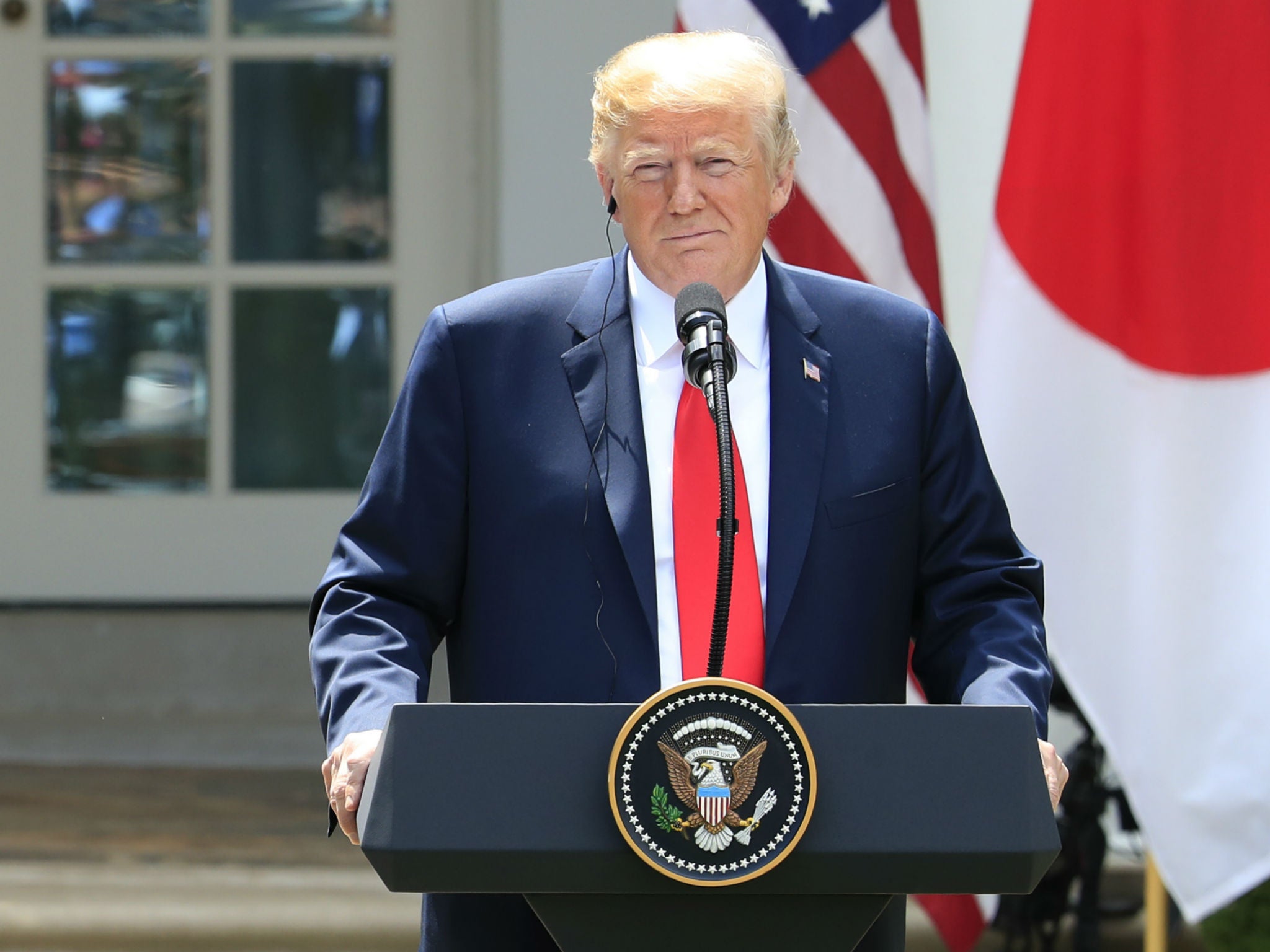 Donald Trump gives a press conference outside the White House after meeting Japan's Prime Minister Shinzo Abe