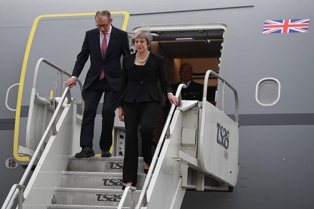 Theresa May and her husband Phillip arrive at CAF Bagotville ahead of the G& summit in Charlevoix, Canada.