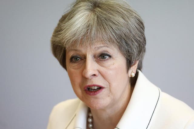 Theresa May told Tory MPs they needed to show the country they were 'united' in their determination to deliver Brexit