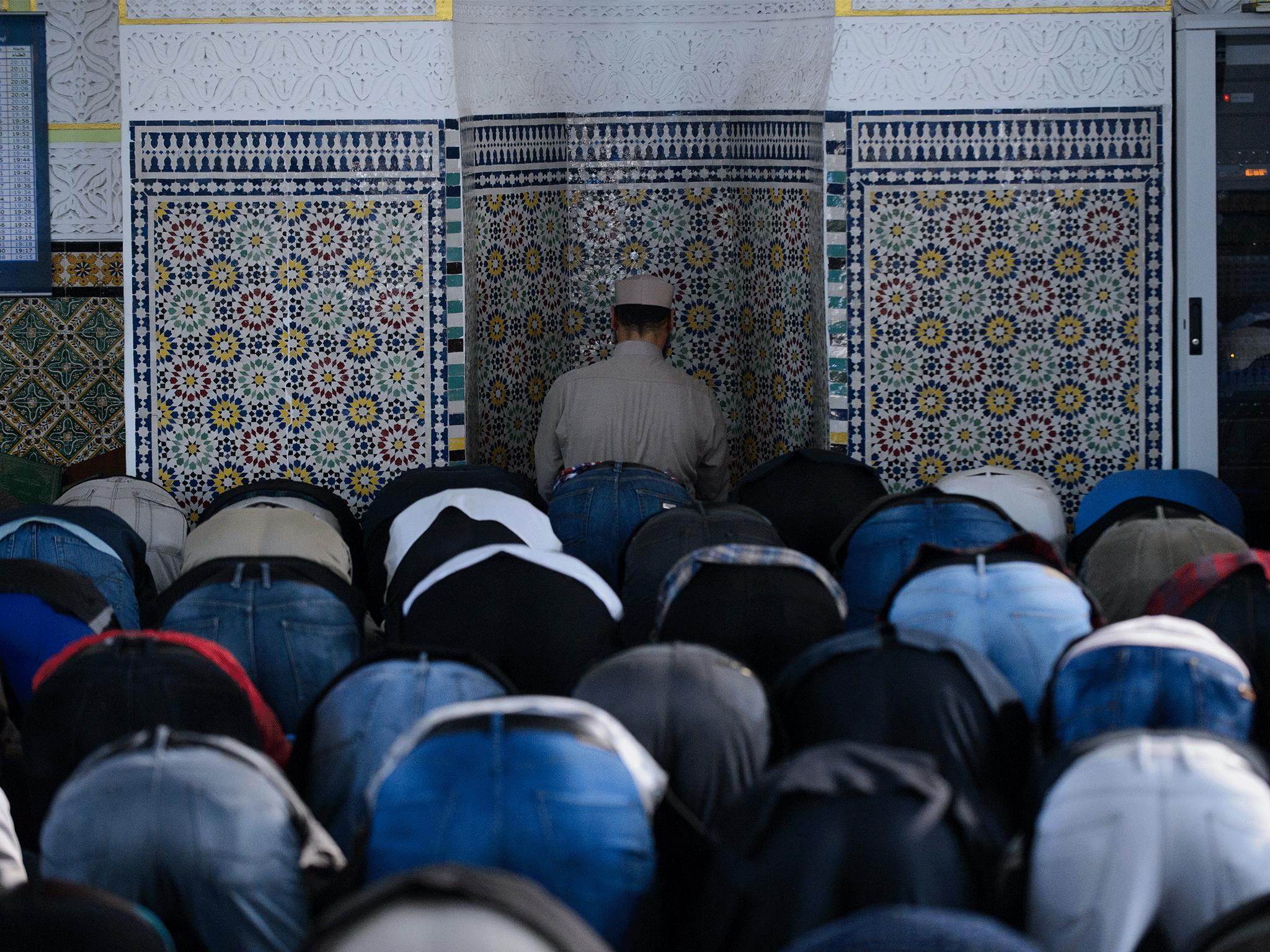 Worshipers hold prayers at a mosque in Vienna