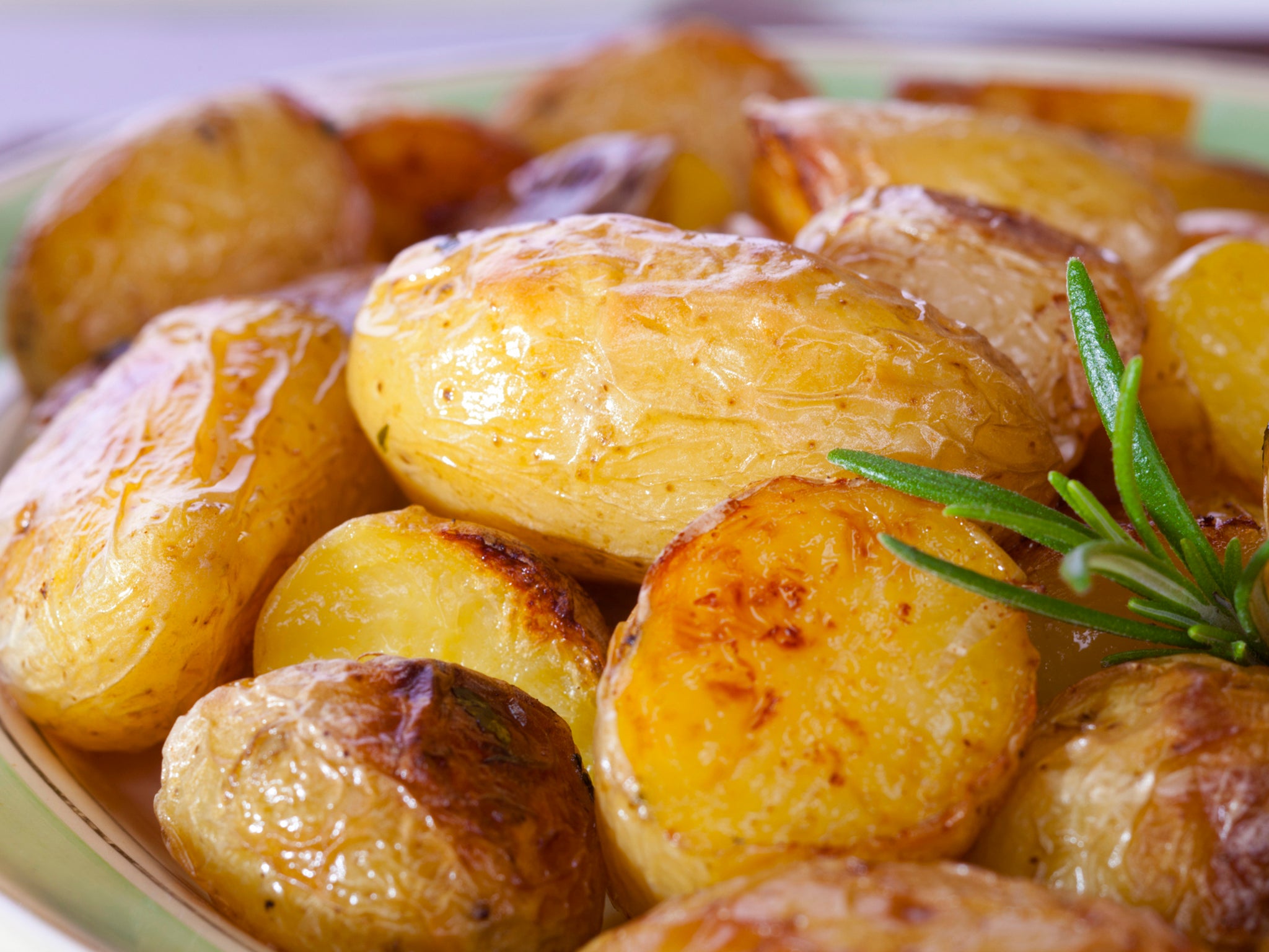 Roast new potatoes with rosemary (iStock