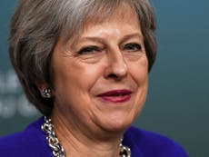 May opens door to allowing MPs vote on Northern Ireland abortion ban
