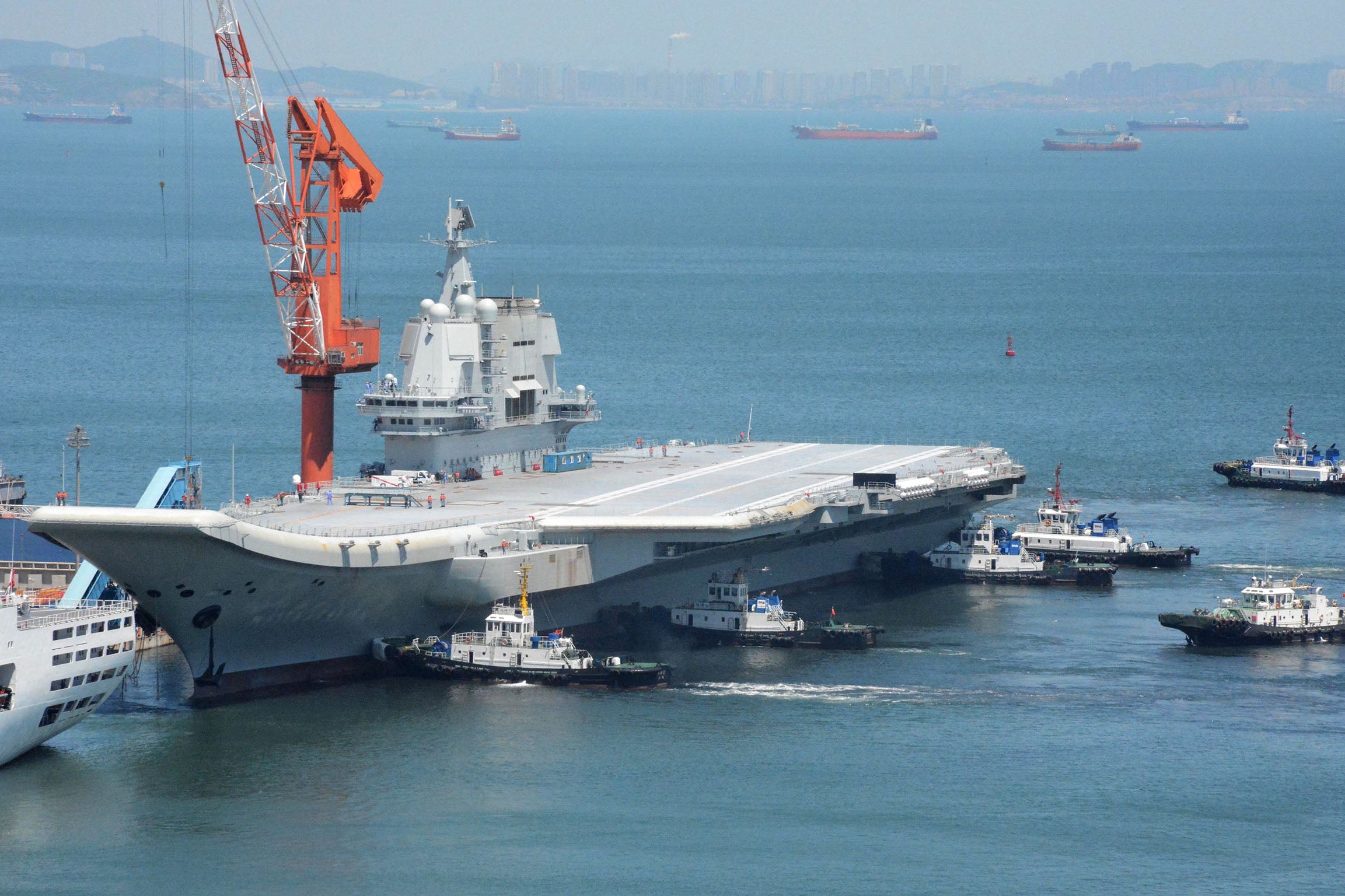 China's first domestically manufactured aircraft carrier returns to port in Dalian after sea trials on 18 May 2018