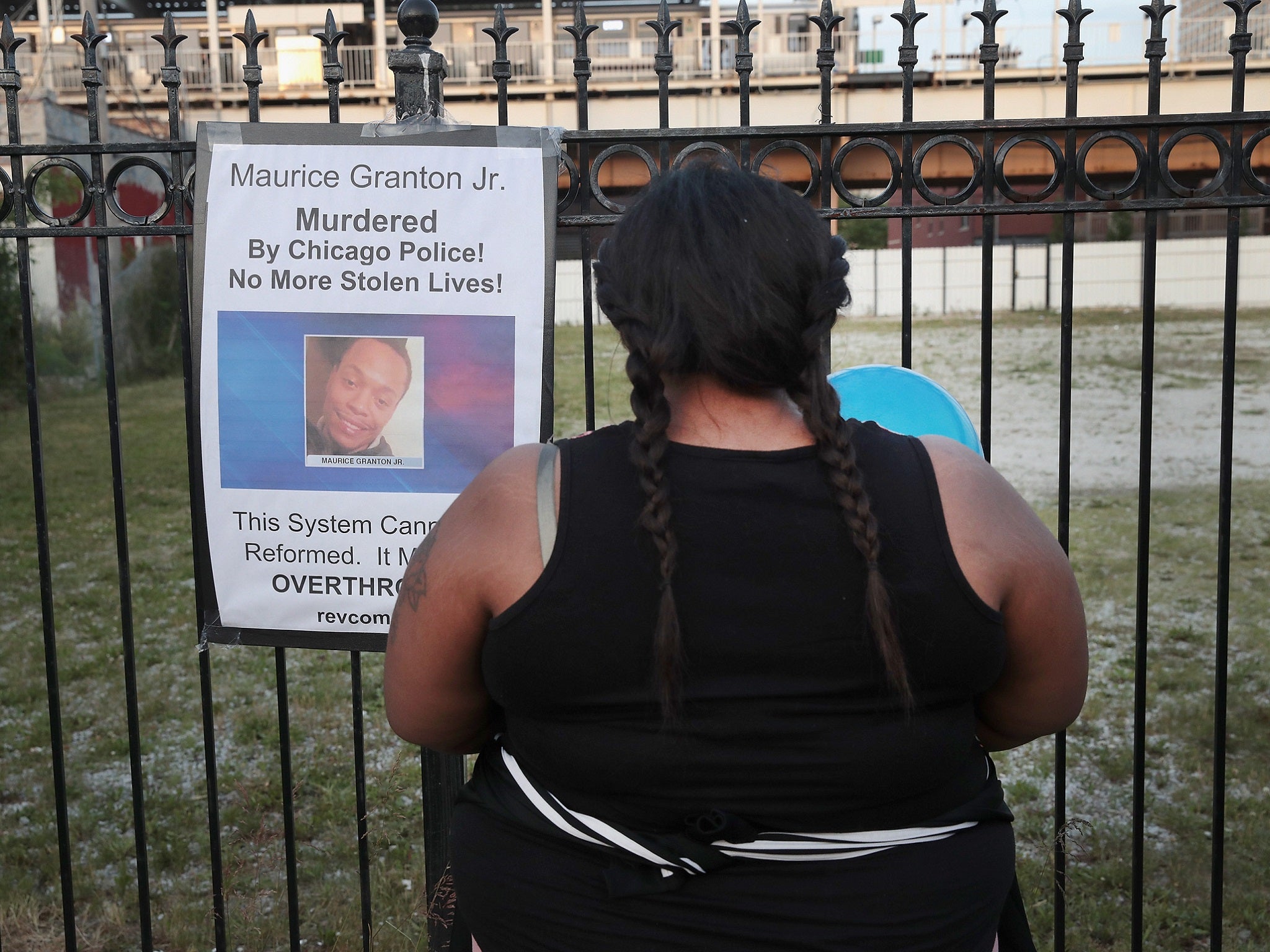 Tayshia Shaw mourns the loss of the father of her children, 24 year old Maurice Granton Jr, during a vigil in the Bronzeville neighborhood on June 7, 2018 in Chicago