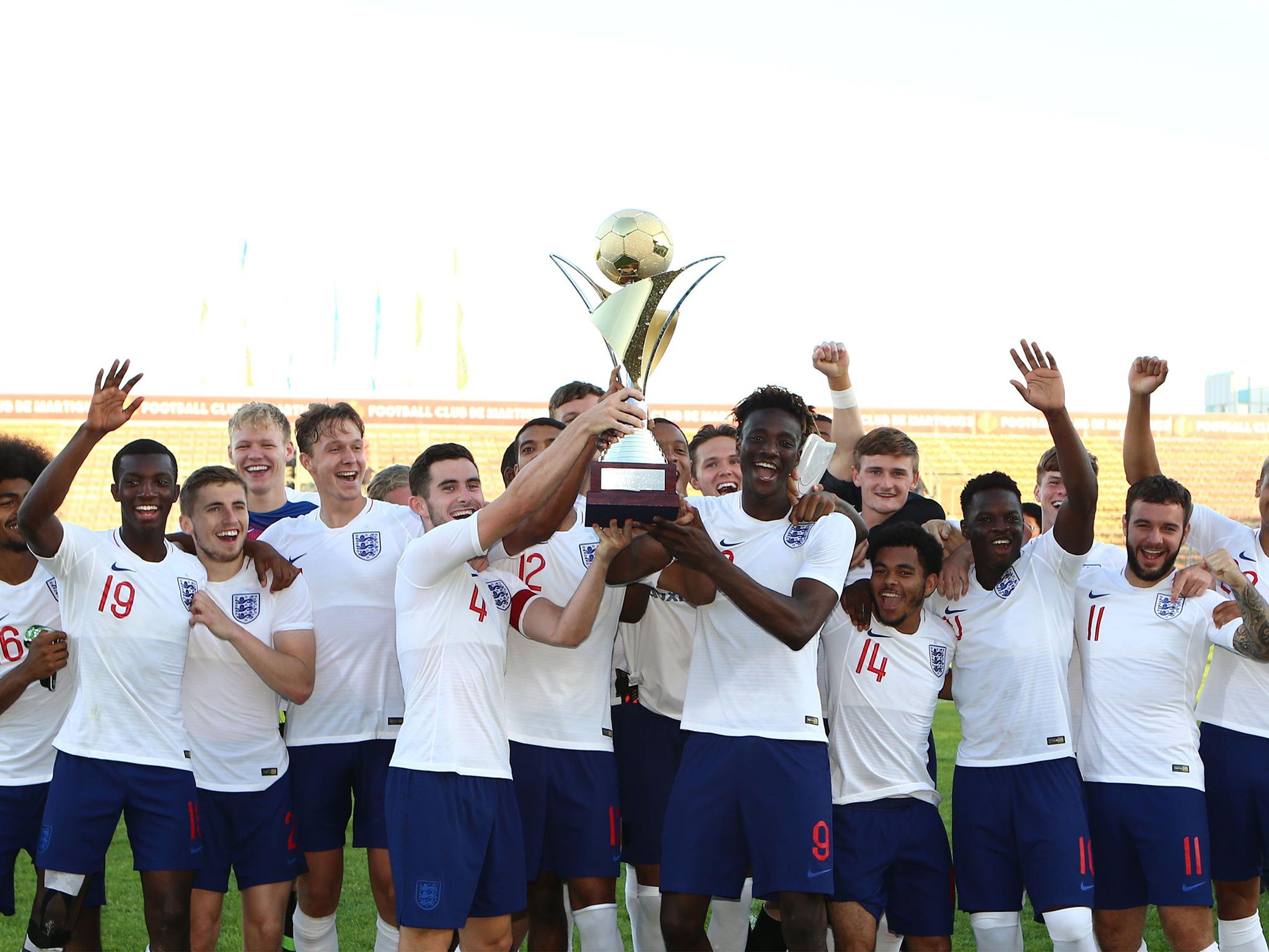 England Under-21s celebrate winning the Toulon Tournament for a third consecutive year