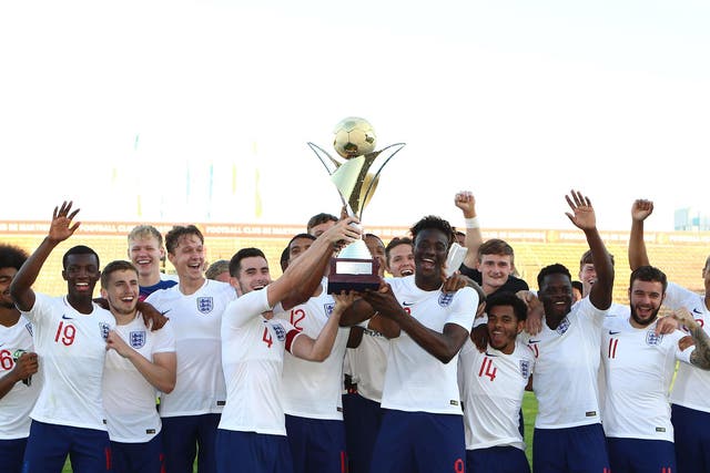 England Under-21s celebrate winning the Toulon Tournament for a third consecutive year