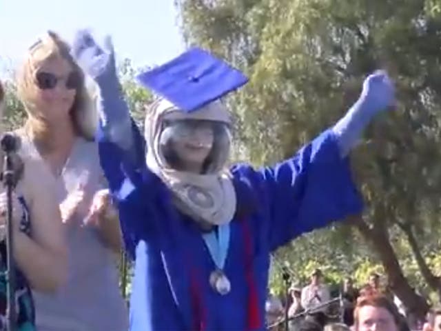 Riley McCoy braved the outdoors to graduate
