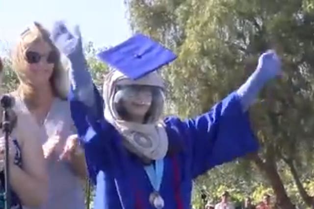 Riley McCoy braved the outdoors to graduate