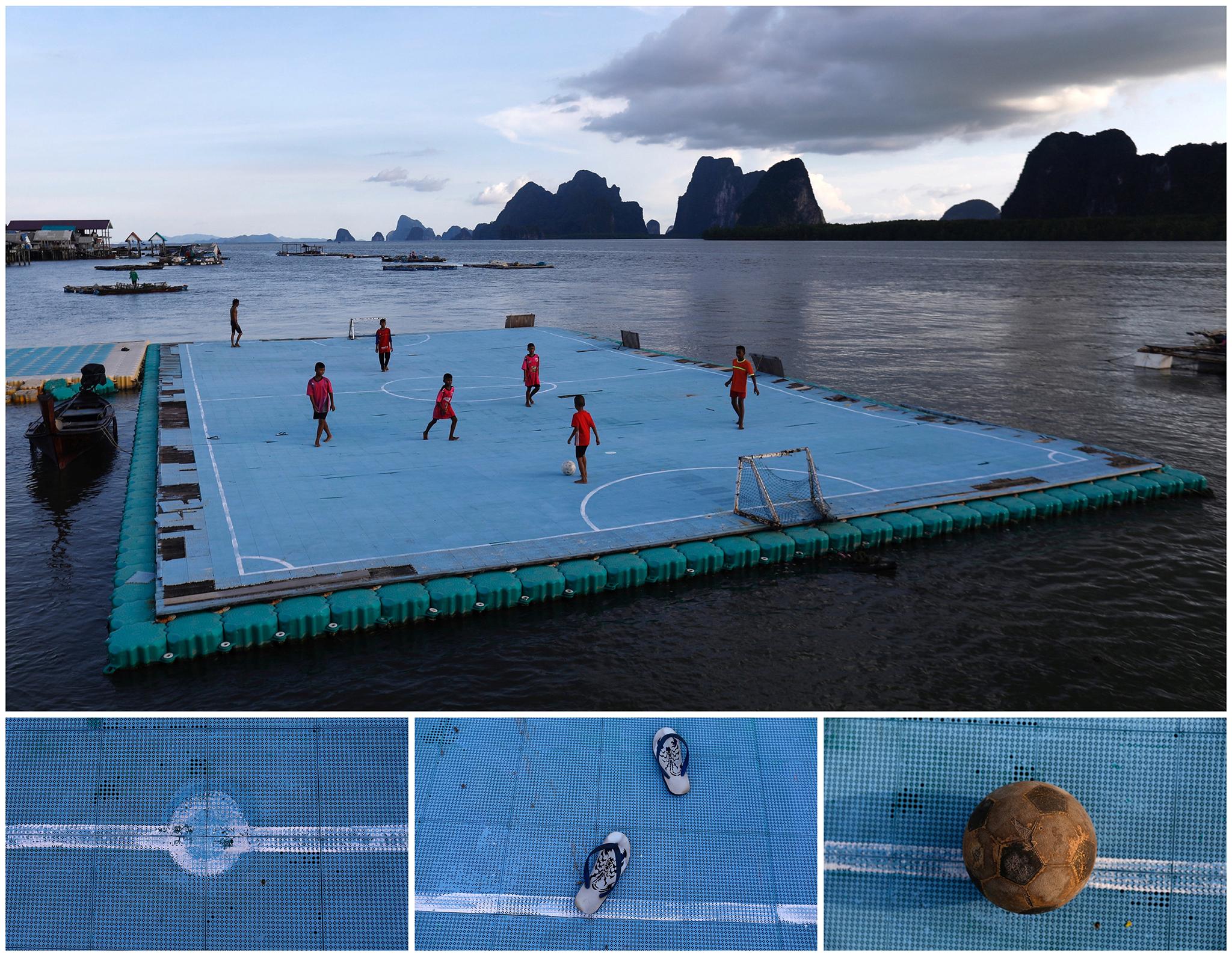 Children playing football on a floating pitch in the fishing village of Ko Panyi, Thailand