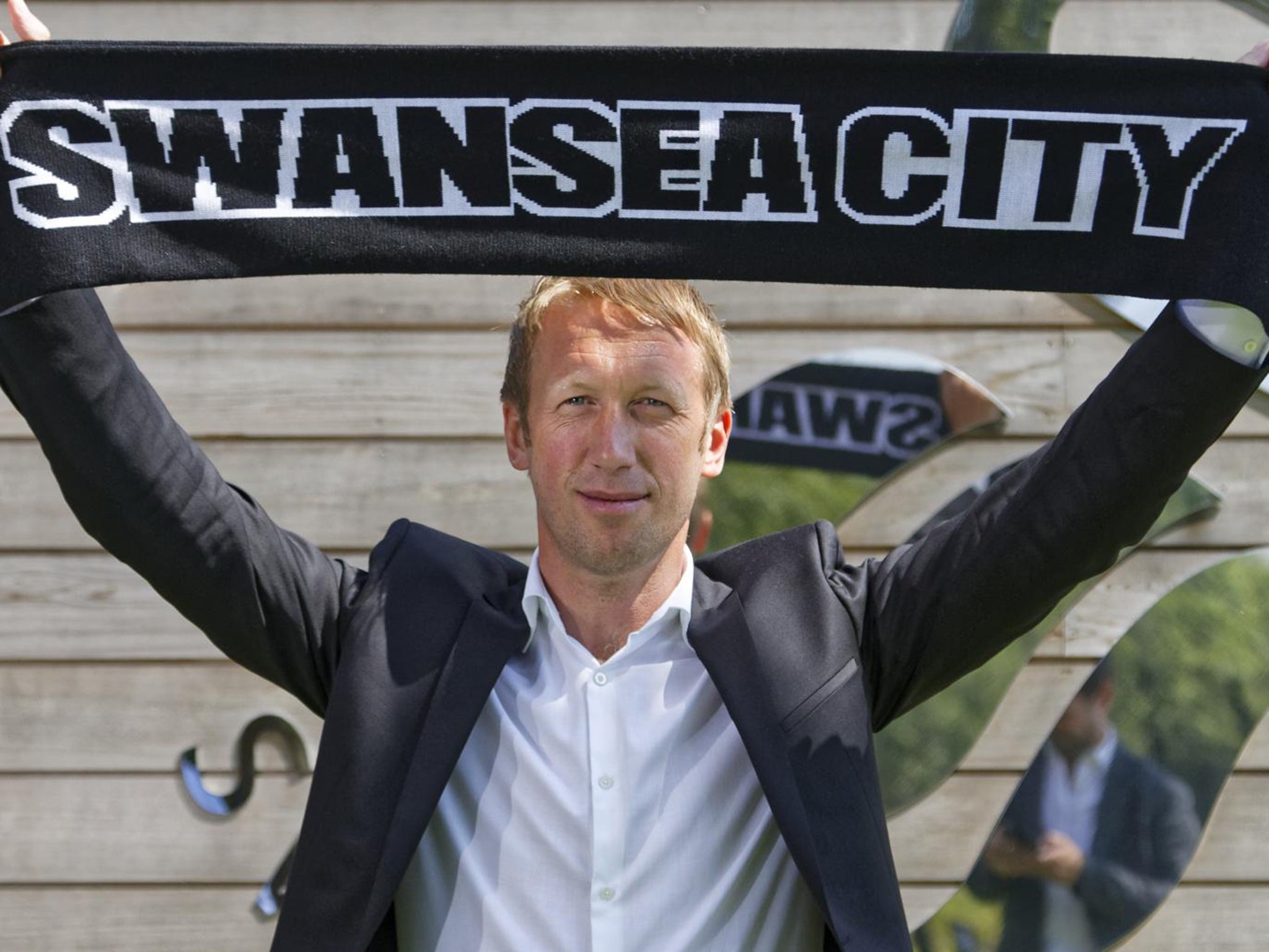 Graham Potter has been named Swansea manager on a three-year deal