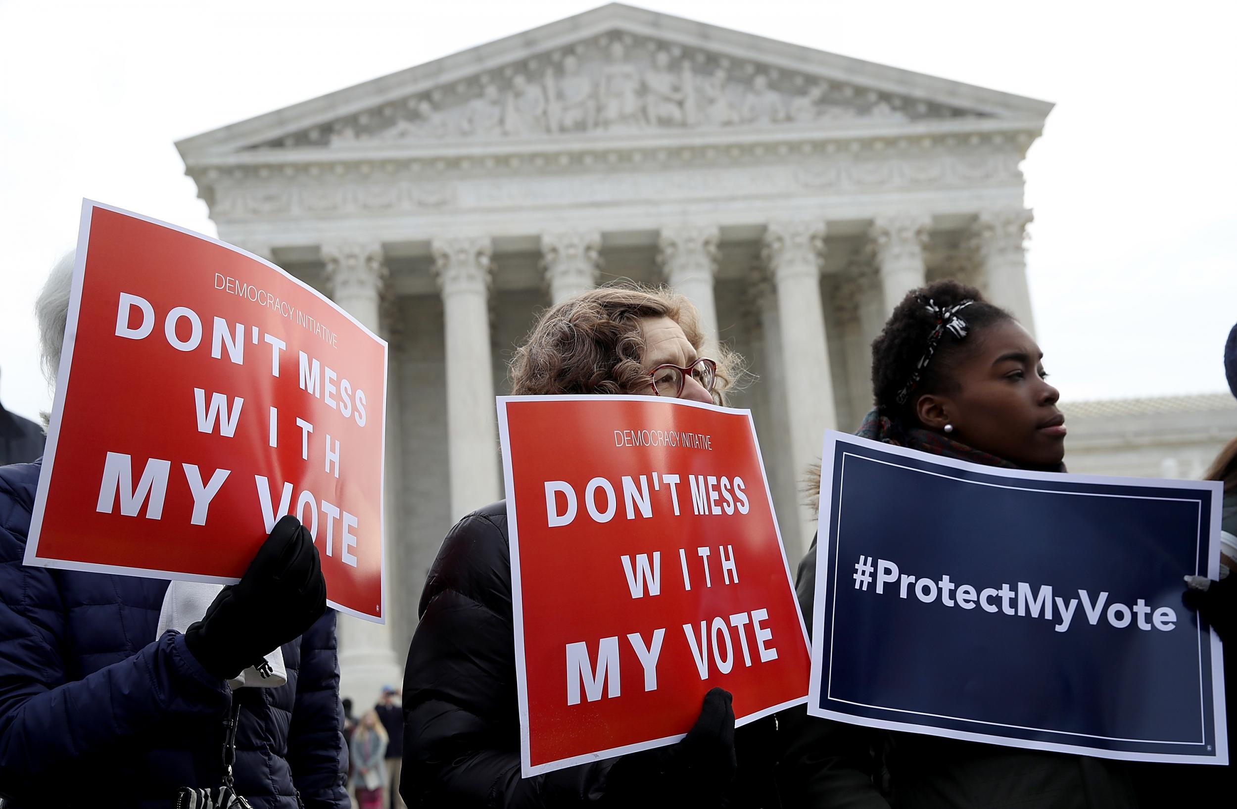 Protesters gather during a rally held by the group Common Cause in front of the US Supreme Court