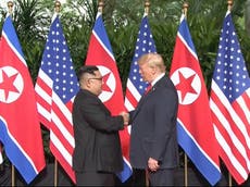 Donald Trump and Kim Jong-un share historic handshake in Singapore