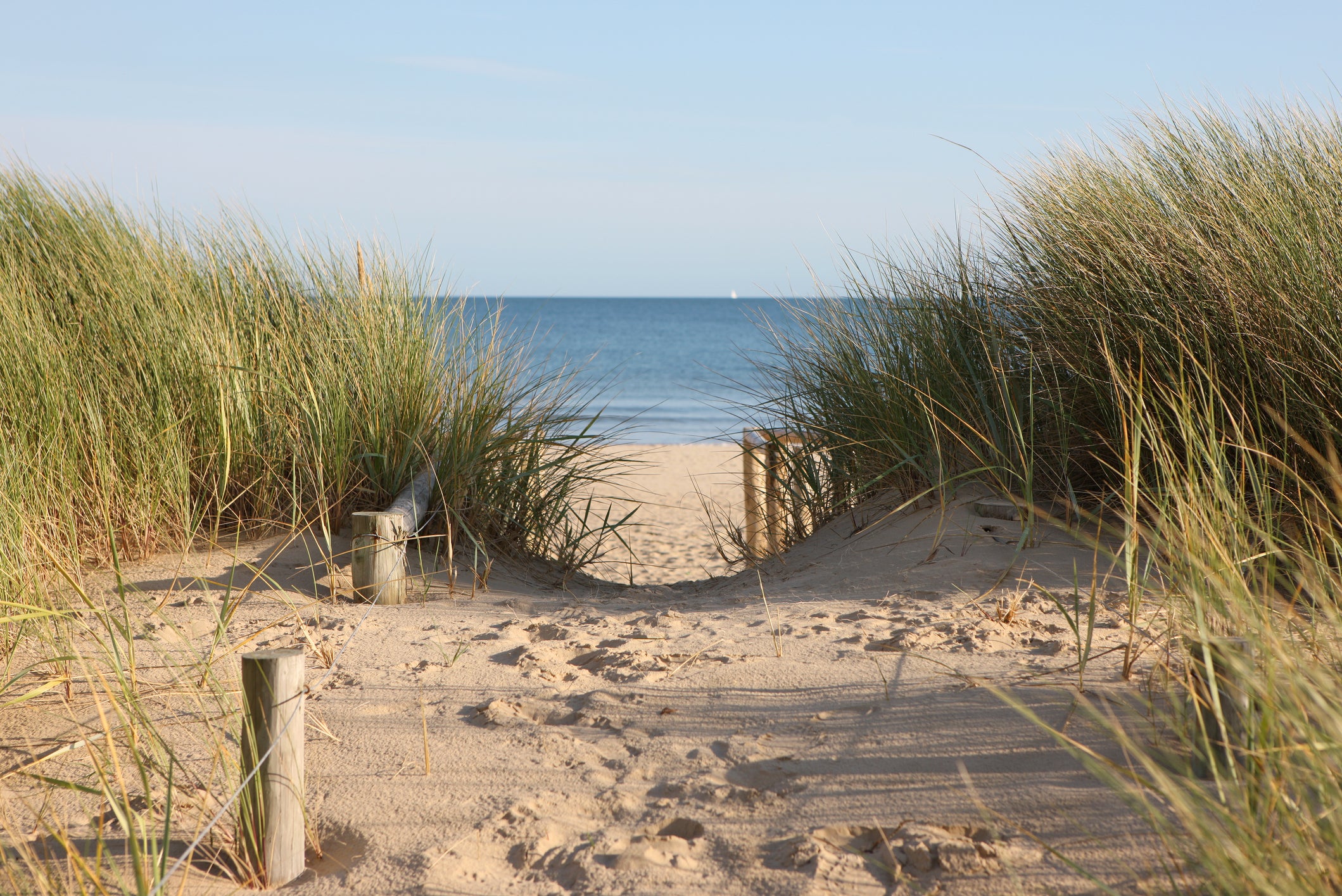 Kick off your shoes and sink into the sand on a Dorset beach