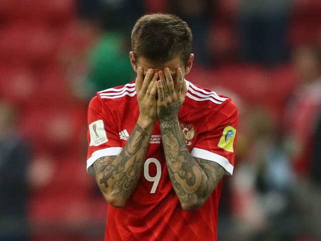 Fedor Smolov of Russia is dejected after the FIFA Confederations Cup Russia 2017 Group A match between Mexico and Russia