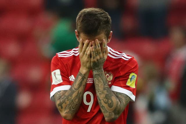 Fedor Smolov of Russia is dejected after the FIFA Confederations Cup Russia 2017 Group A match between Mexico and Russia