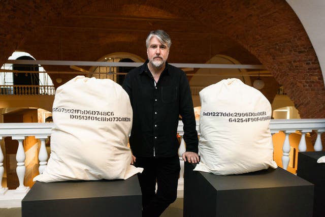 The artist with his ‘Personal Effects’ installation