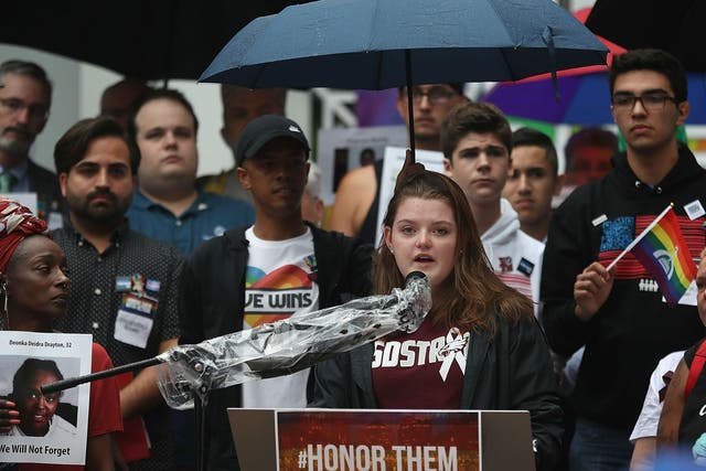 Aly Sheehy, a Marjory Stoneman Douglas High School shooting survivor, speaks during a rally in front of Orlando City Hall