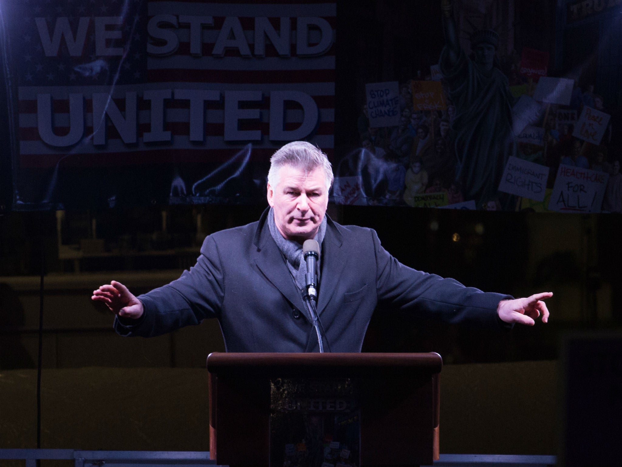Alec Baldwin speaks during an anti-Trump rally in New York City on the eve of Donald Trump's inauguration