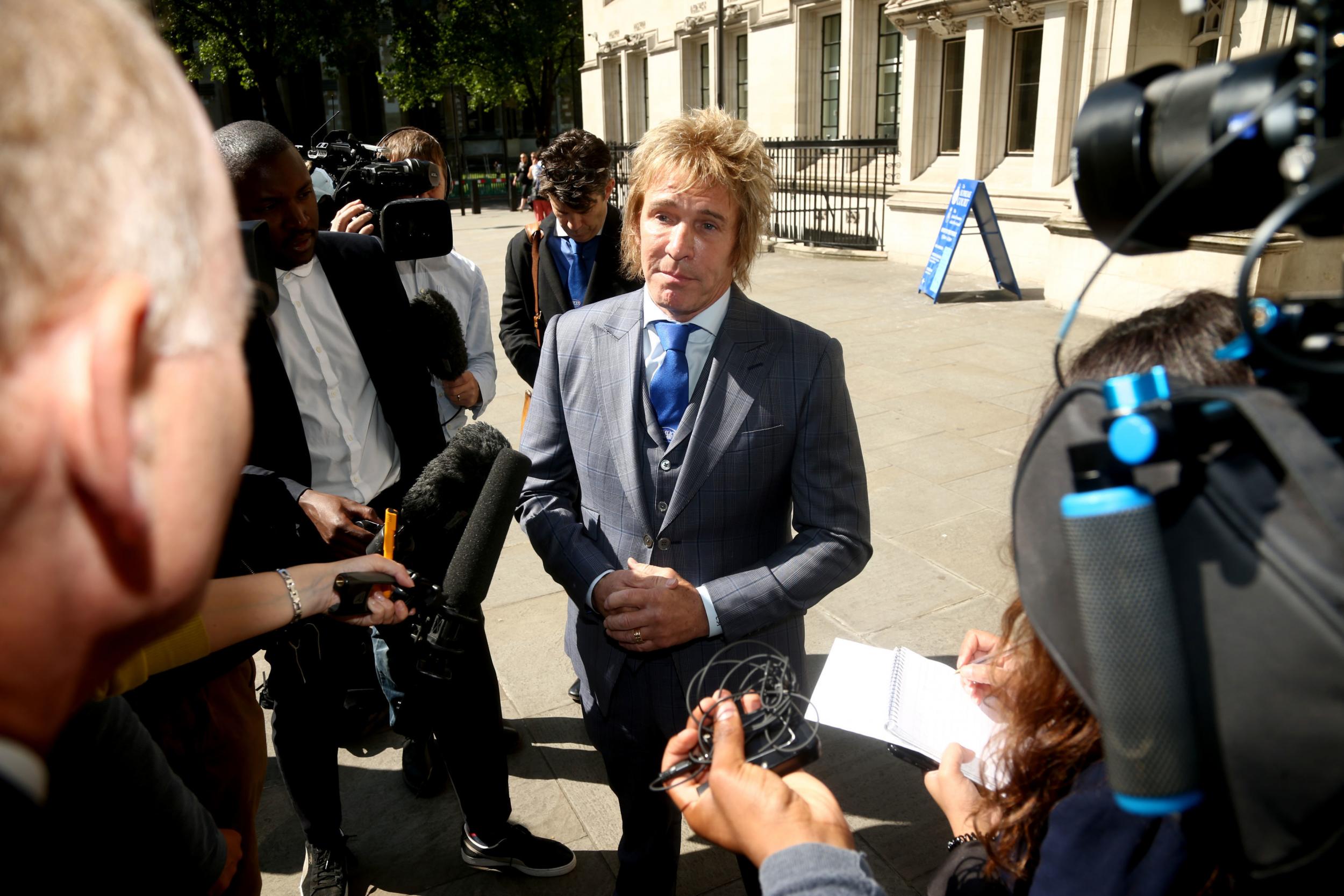 Pimlico Plumbers chief executive Charlie Mullins leaves the UK Supreme Court after the ruling