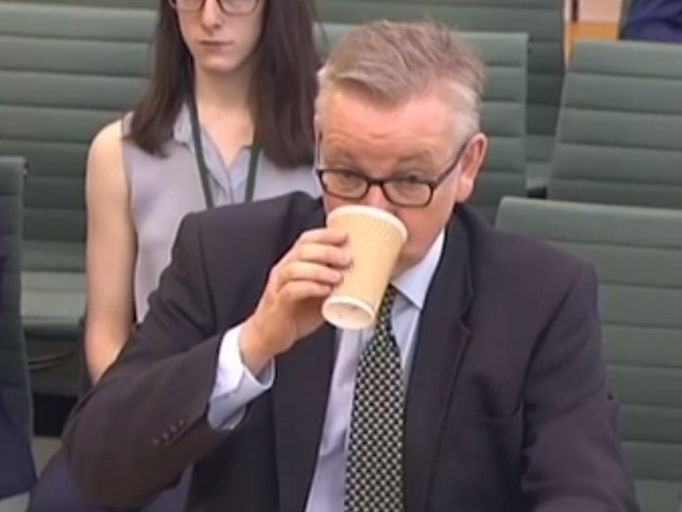 Michael Gove turns up to a meeting on the environment with a disposable coffee cup