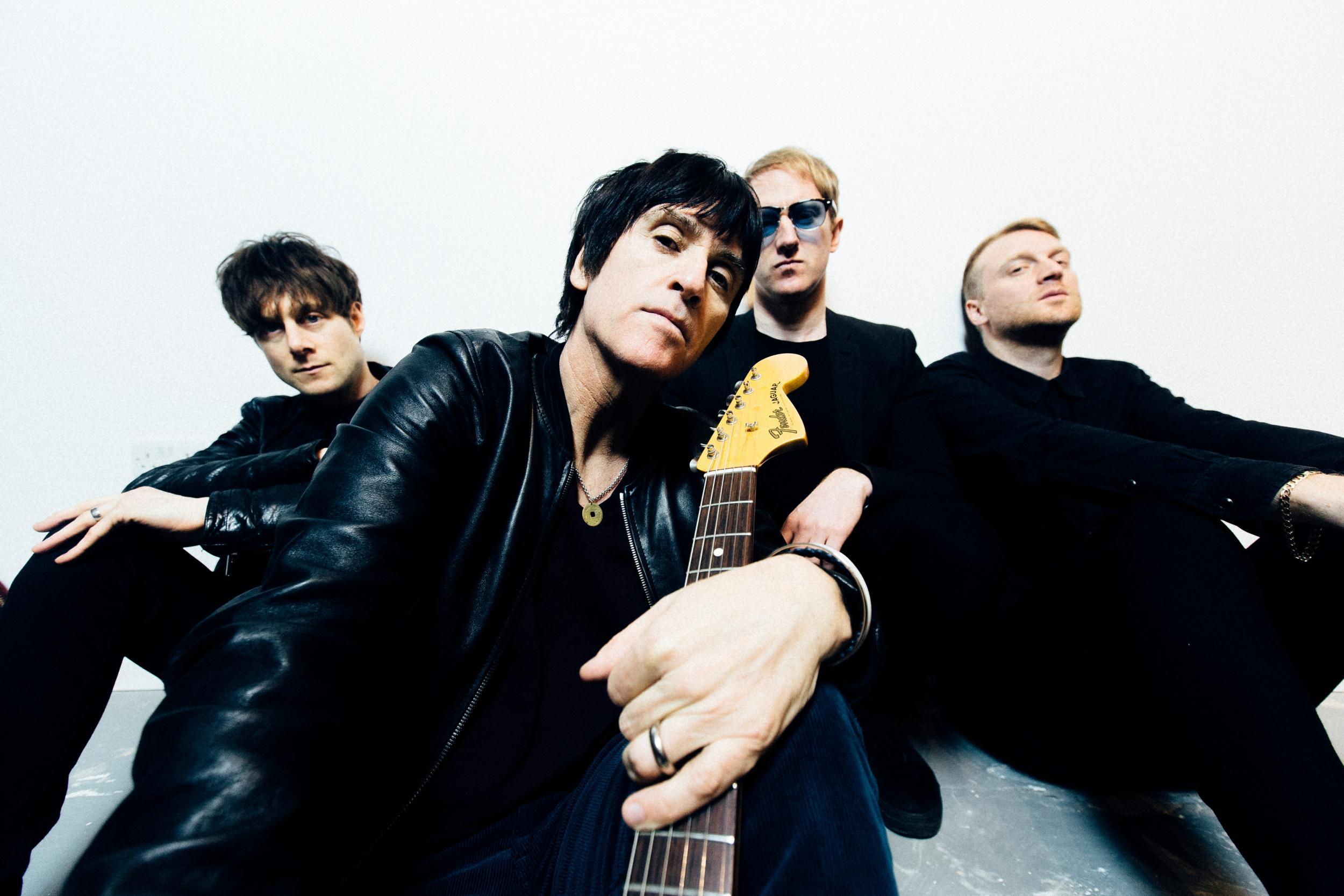 Johnny Marr with his band