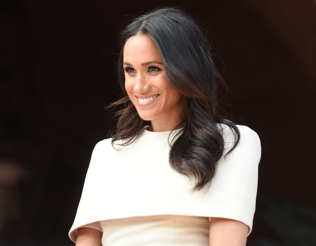 The Duchess of Sussex carried out an official engagement with the Queen today wearing a Givenchy dress
