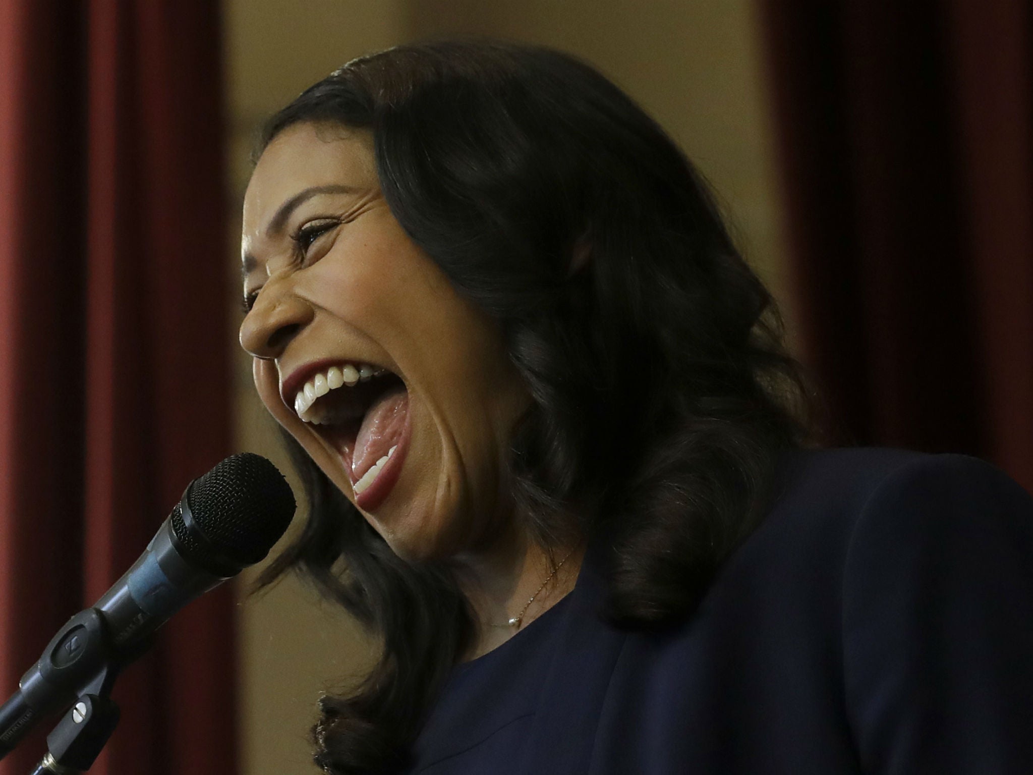Incoming mayor London Breed smiles while speaking at an elementary school in San Francisco