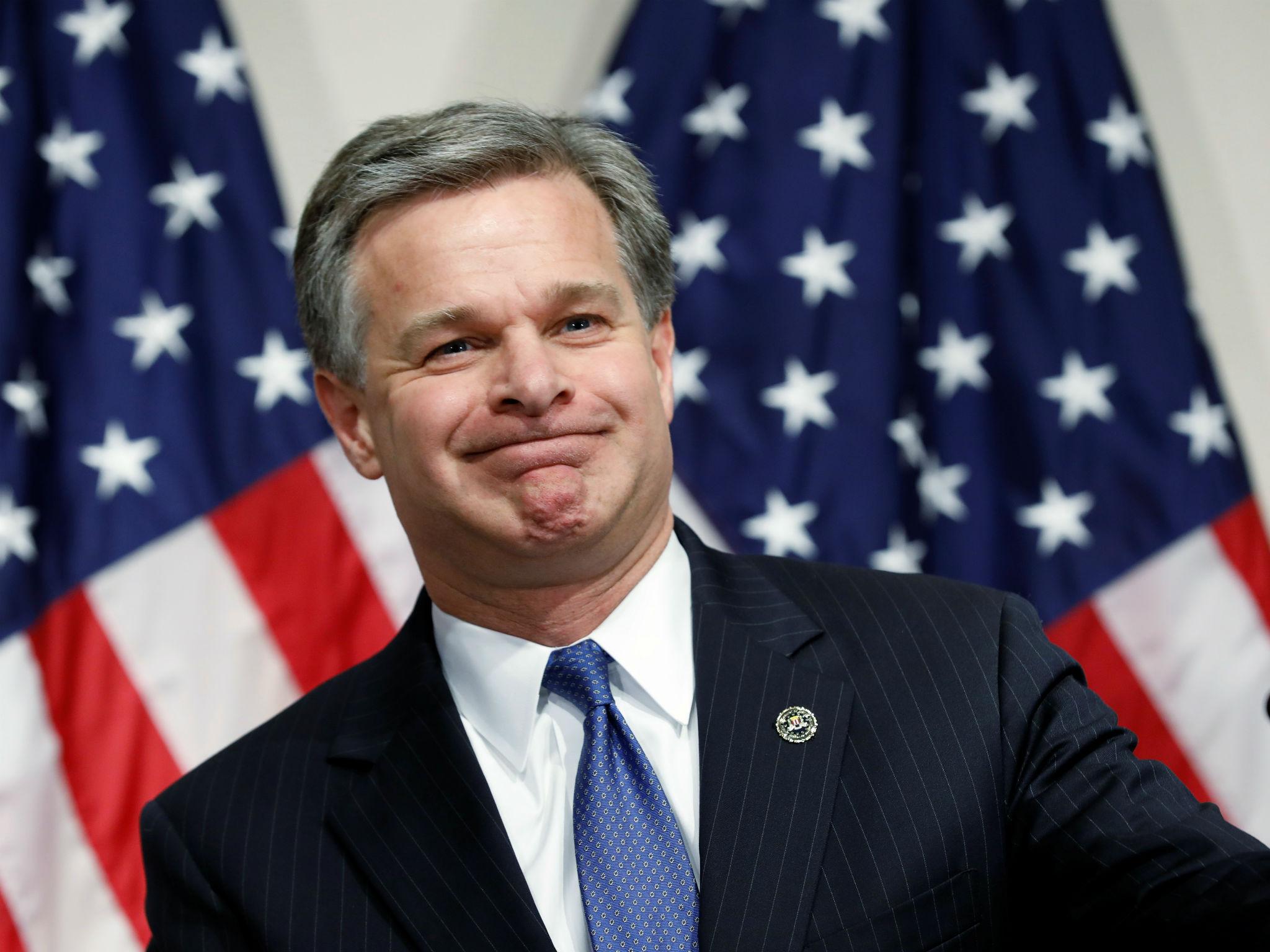 FBI Director Christopher Wray holds a news conference on the US Justice Department's inspector general's report regarding the Federal Bureau of Investigation and the 2016 presidential election