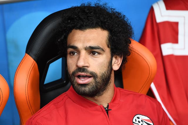 Egypt's forward Mohamed Salah is seen on the substitutes bench
