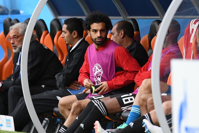 Salah was forced to watch on from the sidelines 