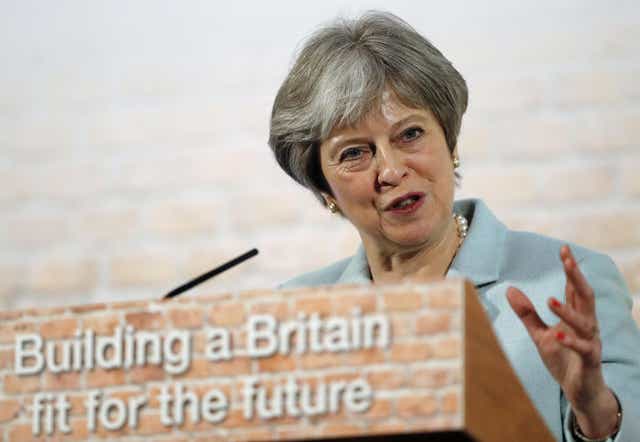 Britain's Prime Minister Theresa May delivers a speech on new housing developments, in central London on March 5, 2018. / AFP PHOTO / POOL / Frank Augstein