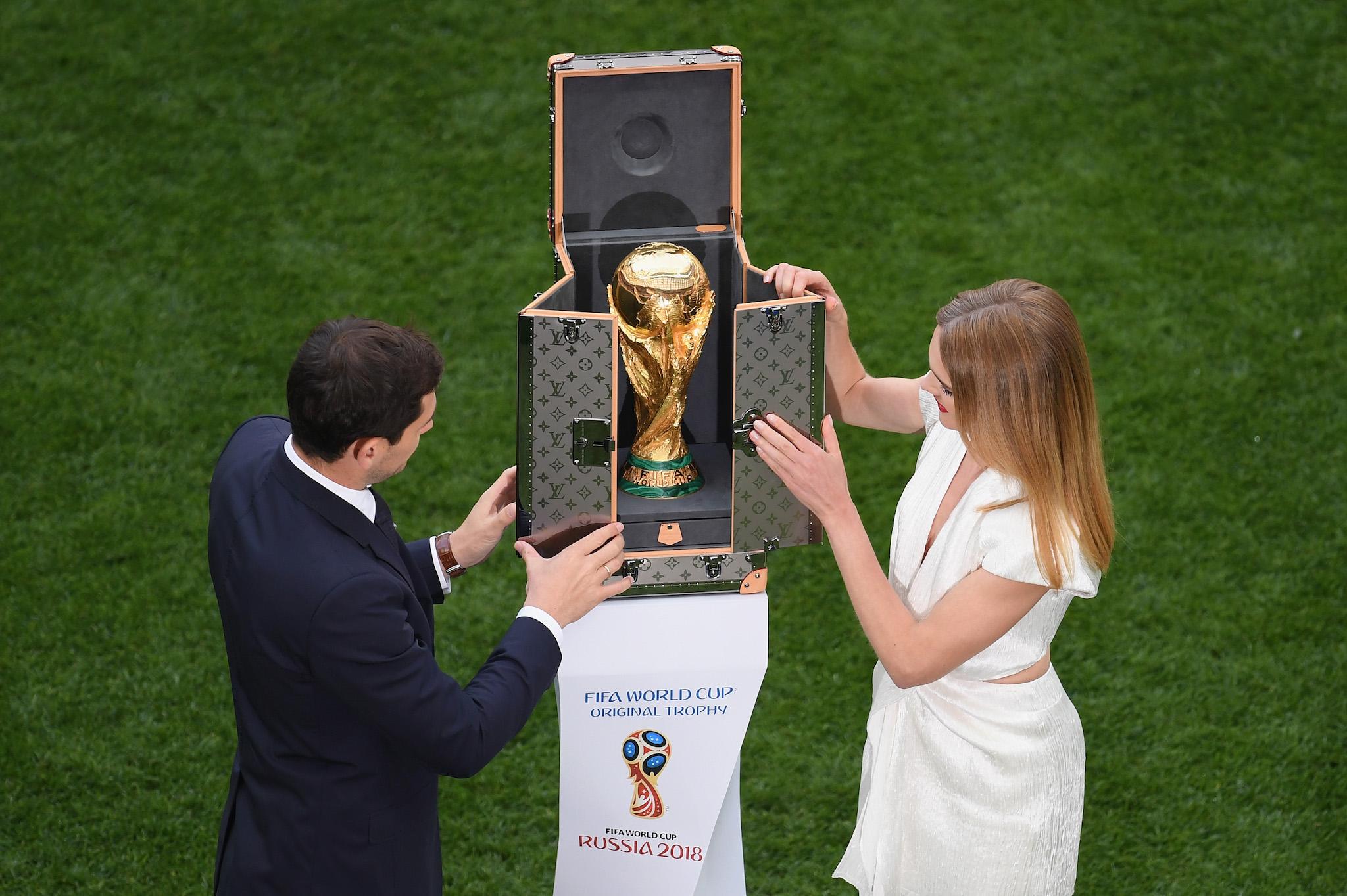 Spain legend Iker Casillas and model Natalia Vodianova show the World Cup trophy prior to the 2018 FIFA World Cup Russia group A match between Russia and Saudi Arabia