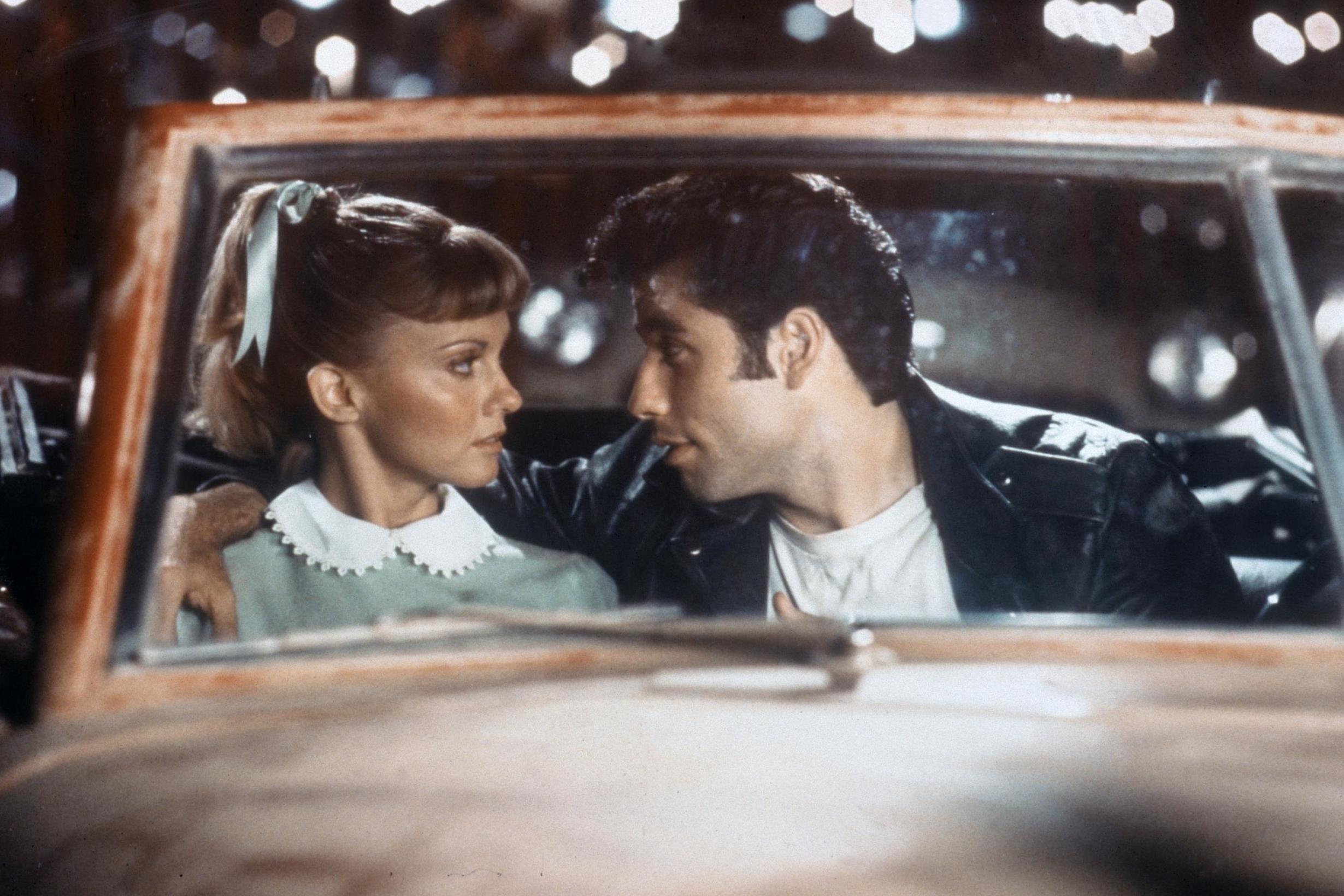 Sandy has no issue pushing Danny off her at the drive-in (Rex Features)