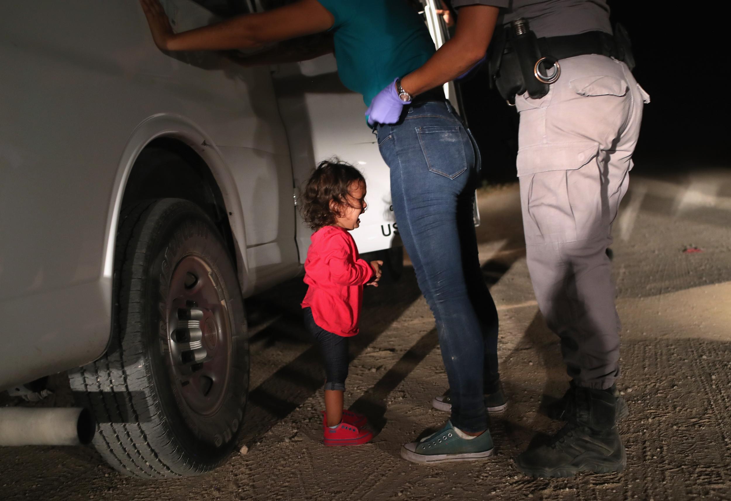 Image result for kid crying cause separated from families at the border, misleading