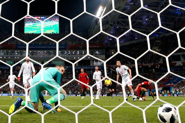 David de Gea watches on as Cristiano Ronaldo's shot escapes him