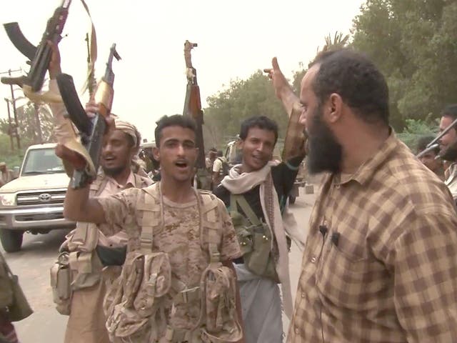 Yemeni pro-government forces gather near Hodeida airport on Friday