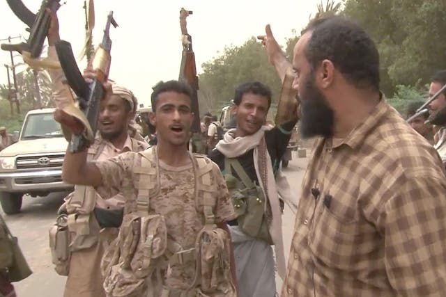 Yemeni pro-government forces gather near Hodeida airport on Friday