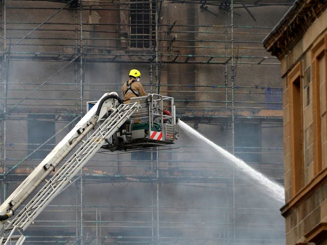 Fire fighters attend the scene of a second fire at Glasgow's School of Art four years after part of the Charles Rennie Mackintosh-designed building was destroyed by fire
