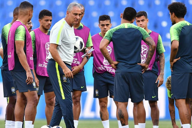 Tite in training with his players ahead of the Switzerland clash