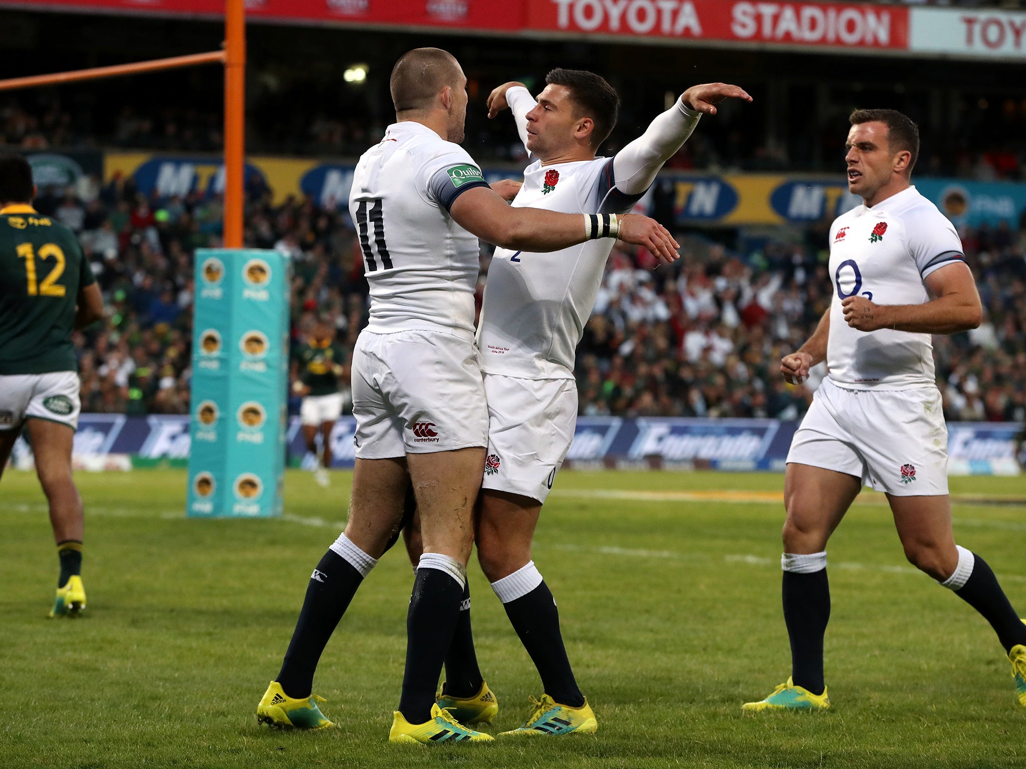 Ben Youngs celebrates with Mike Brown after his try